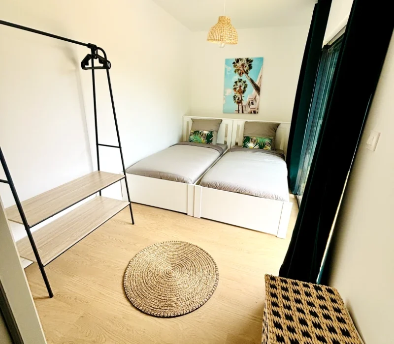 chambre_avec_2_lits_conforts_villa_evasion_tropical